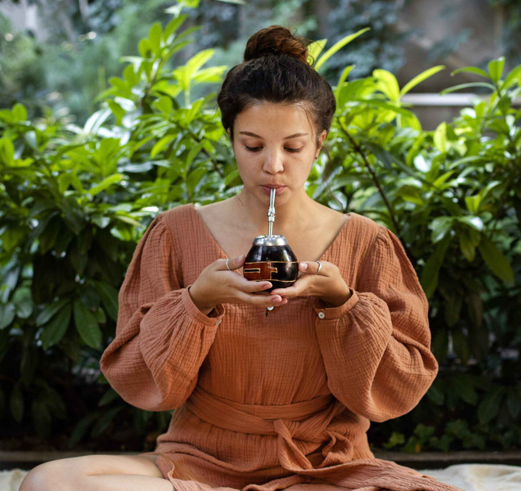 woman meditating outdoors front view (1)